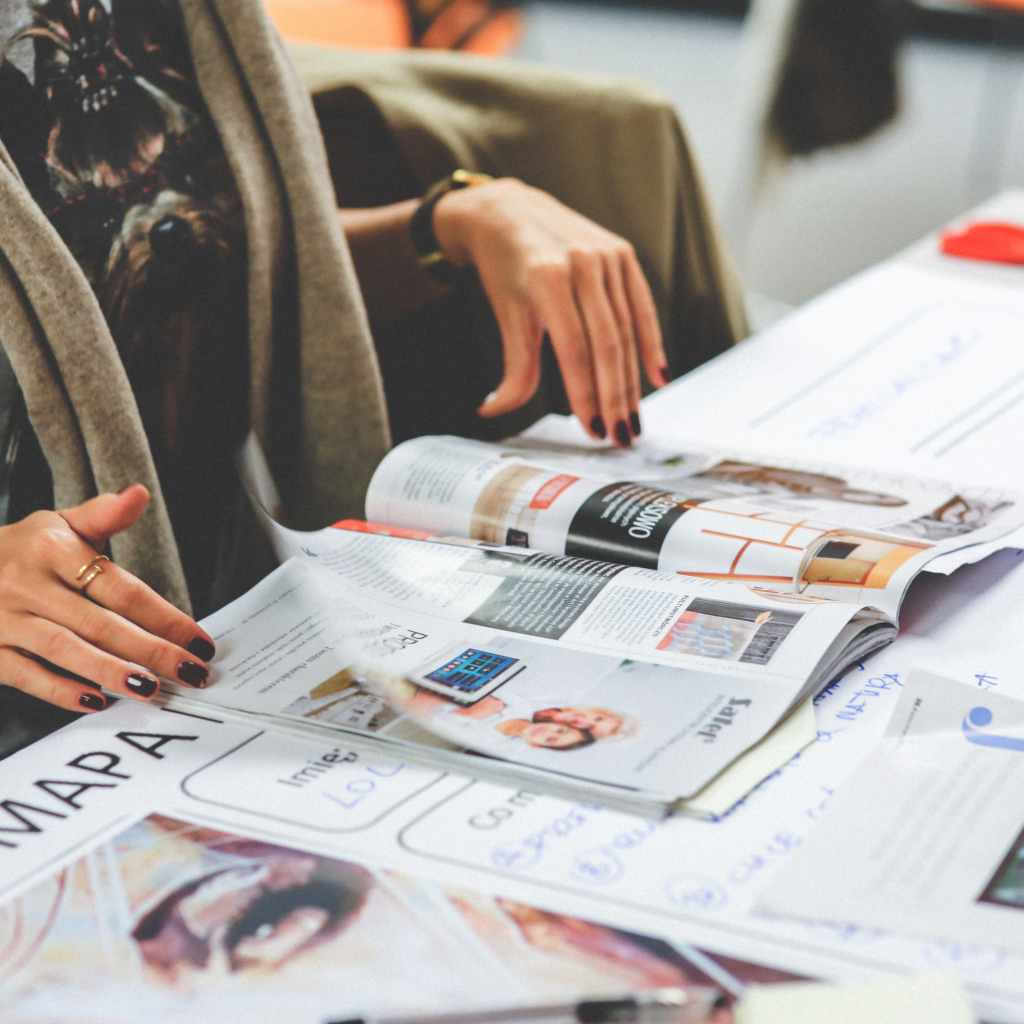 Woman flipping through magazine